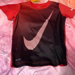 Red sports shirt by Nike